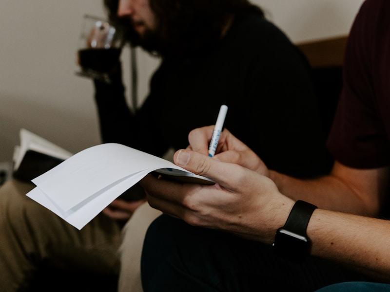 Journalist reviewing interview notes